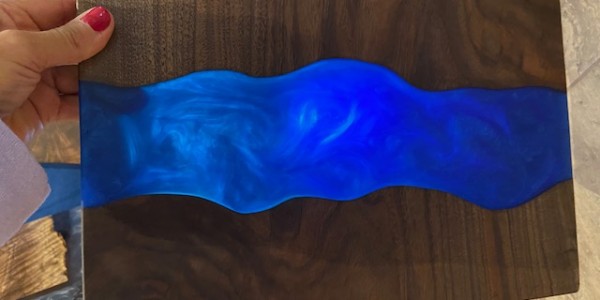 Dark walnut platter with blue epoxy river